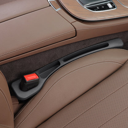 Un Tapón para El Espacio entre Los Asientos del Automóvil.